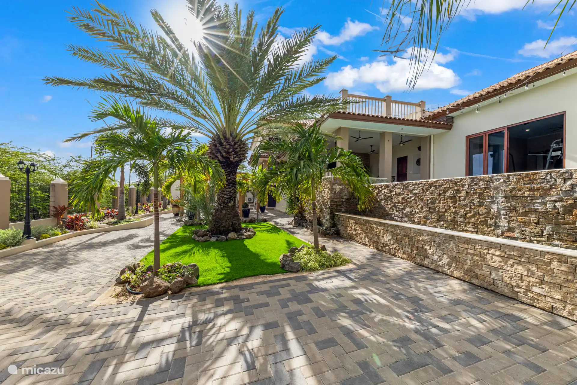 Between palms and flowers, every step feels like a mini-vacation.