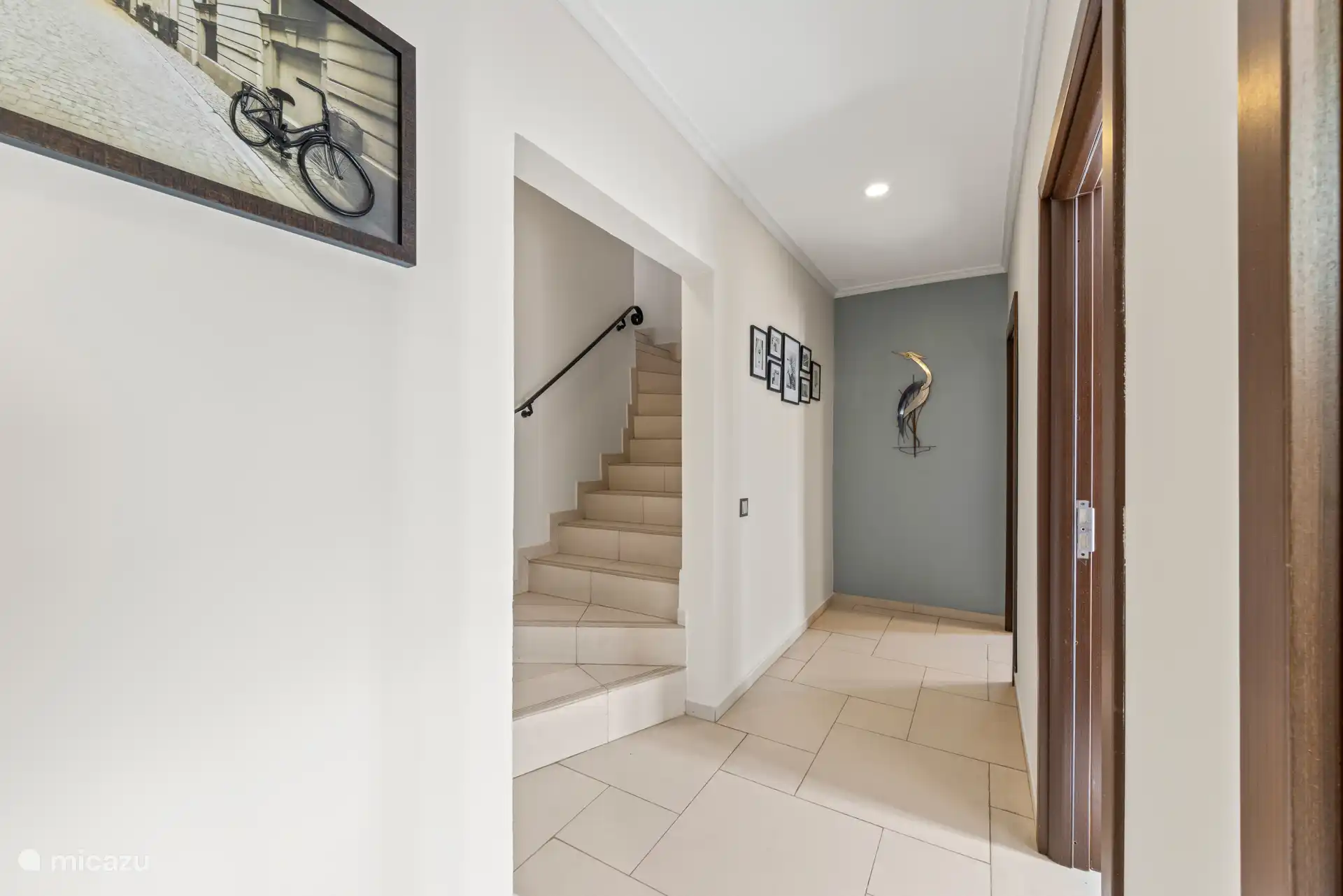 Follow the stairs to your comfortable master bedroom on the first floor