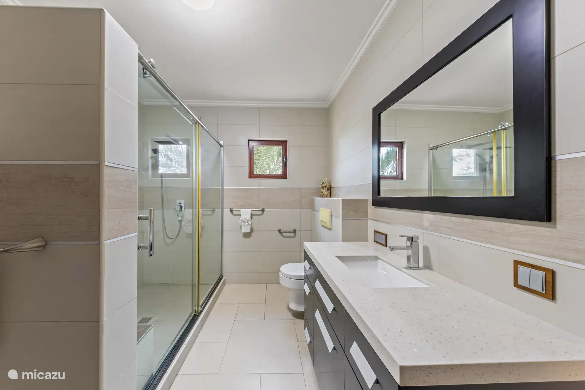 Step inside and enjoy a generous shower – nice and spacious and refreshing!