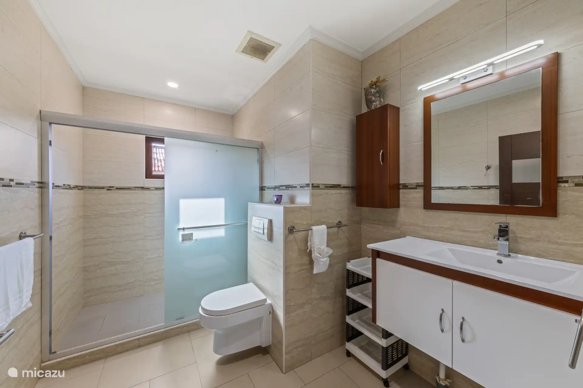 Relax in the shower or start your day fresh in this nice bathroom.