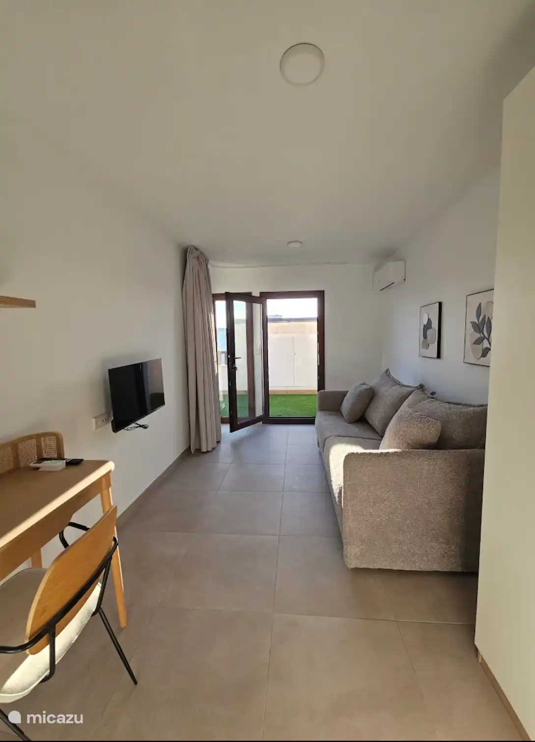 Tercer dormitorio con sofá cama doble en el segundo piso