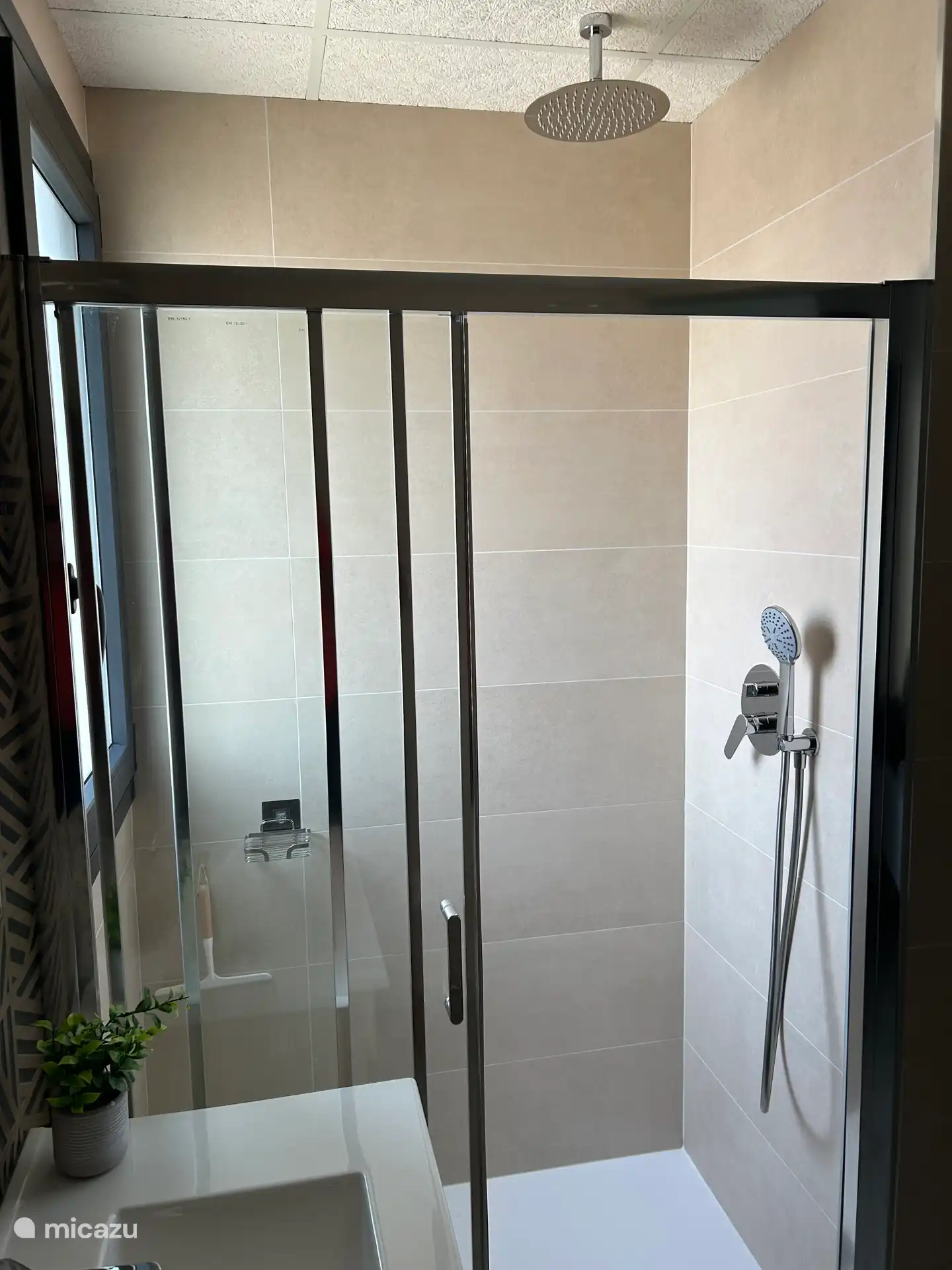 The bathrooms have a wonderful rain shower 