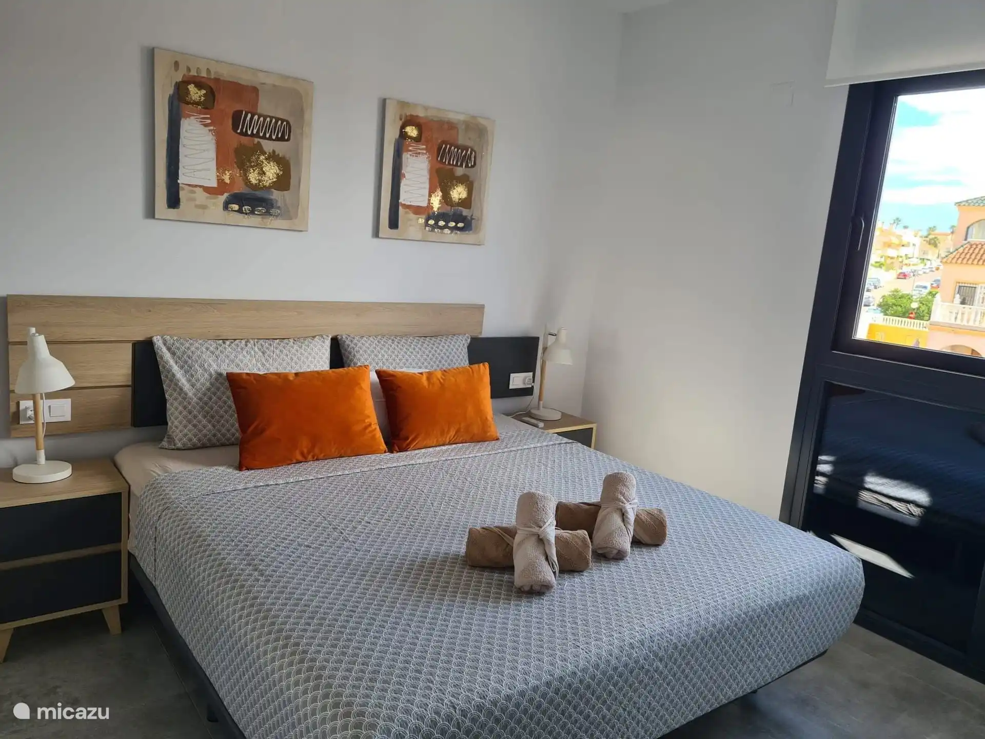 Luxury bedroom with ensuite luxury bathroom with rain shower