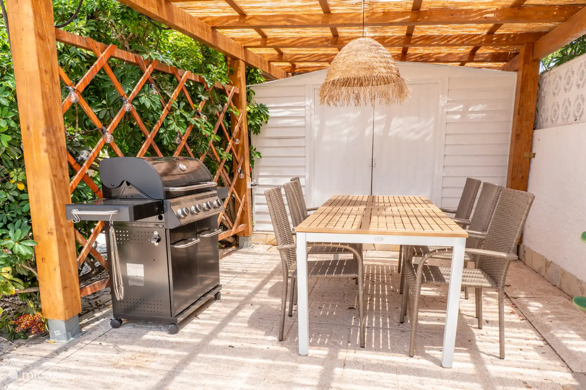 Covered dining area with BBQ