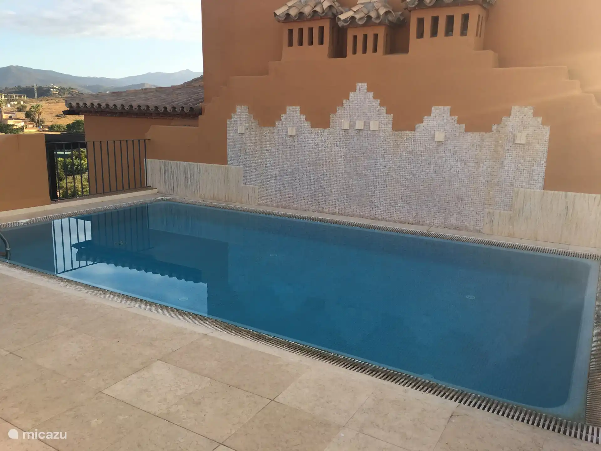 This is your private swimming pool which is located on the rooftop.