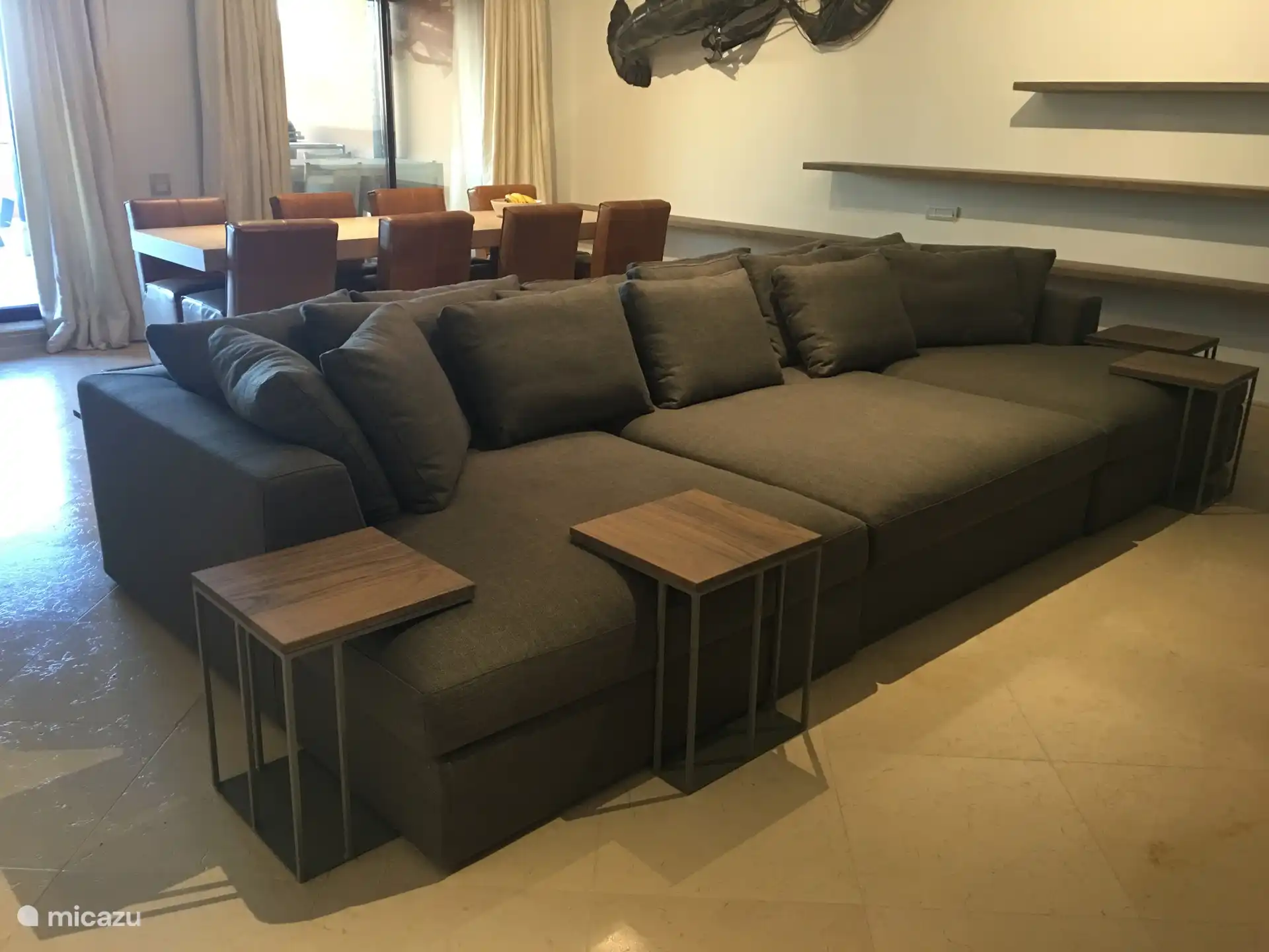 On this huge bench you can watch TV with the whole family lying down.