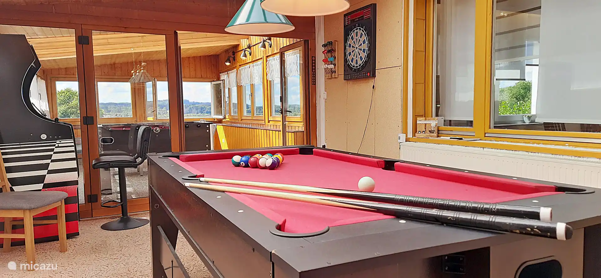 Winter garden with billiards, darts, table football and slot machine