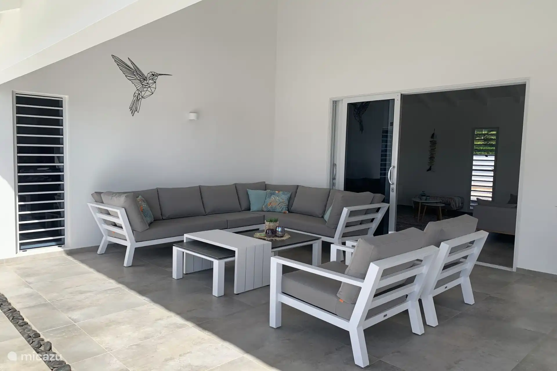 Überdachte Veranda mit Lounge-Set
