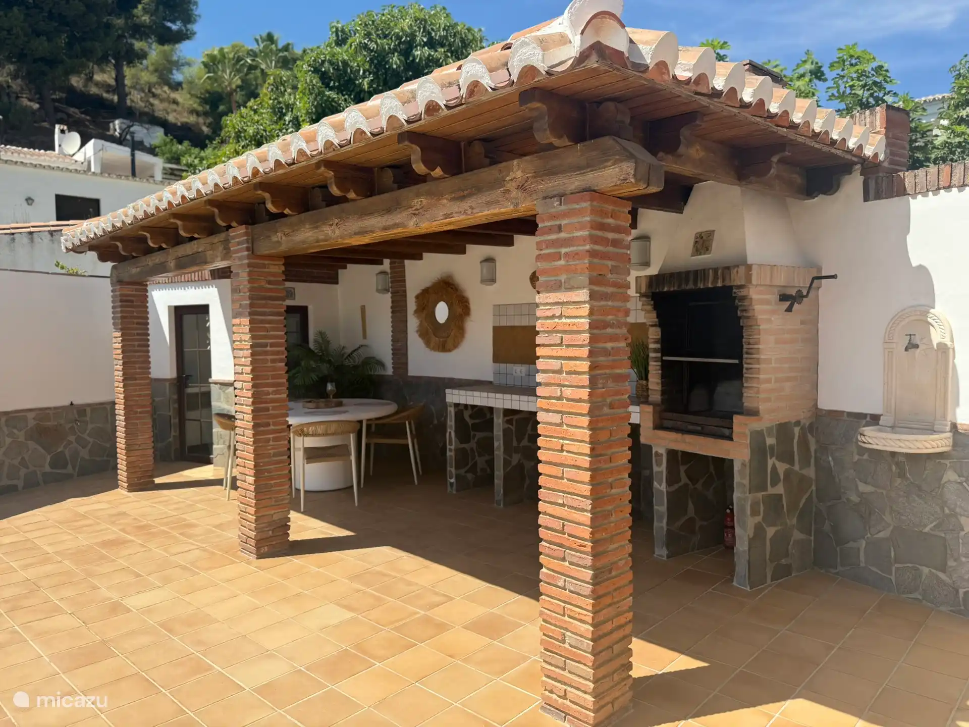 Marquesina con cocina exterior