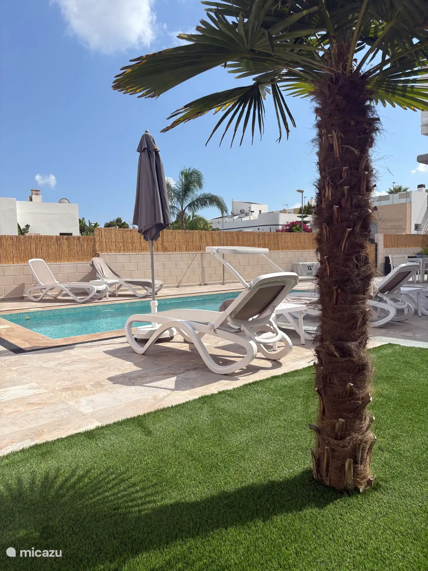 Terrace with sunbeds, parasol, lounge set,..
