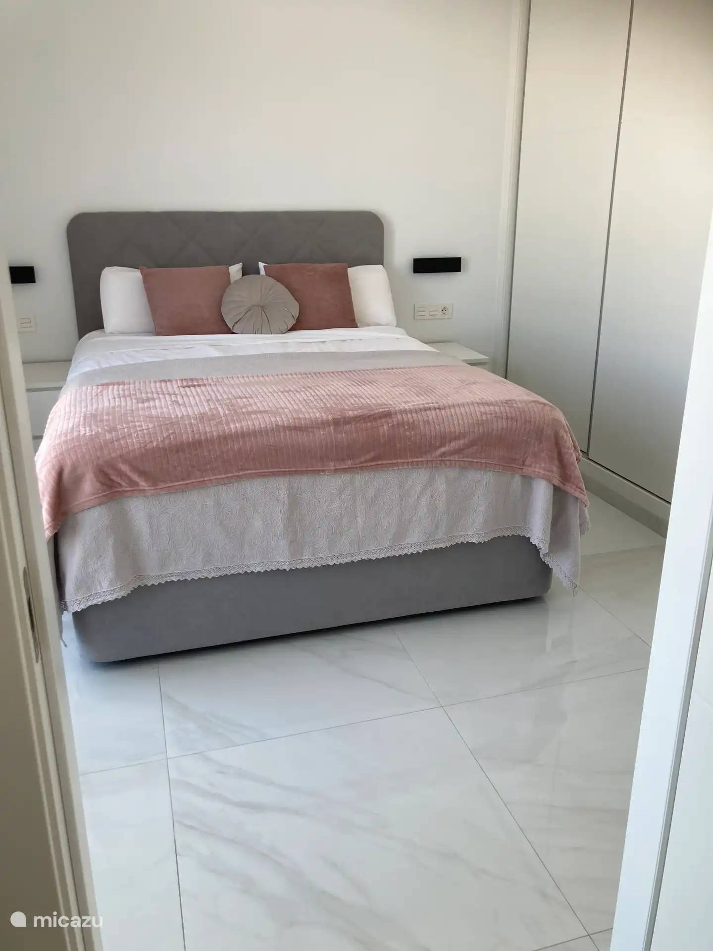 Master bedroom with large built-in wardrobe 