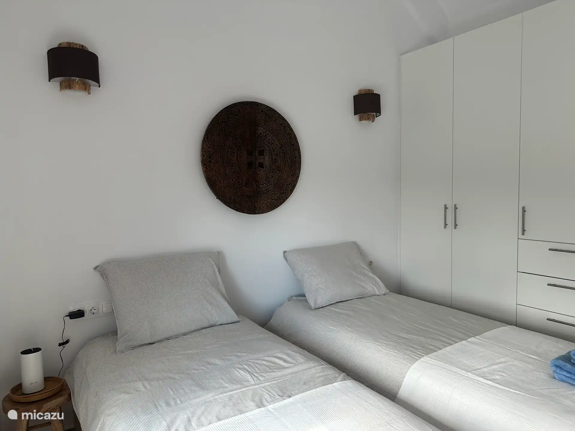 Third bedroom with Balinese art.