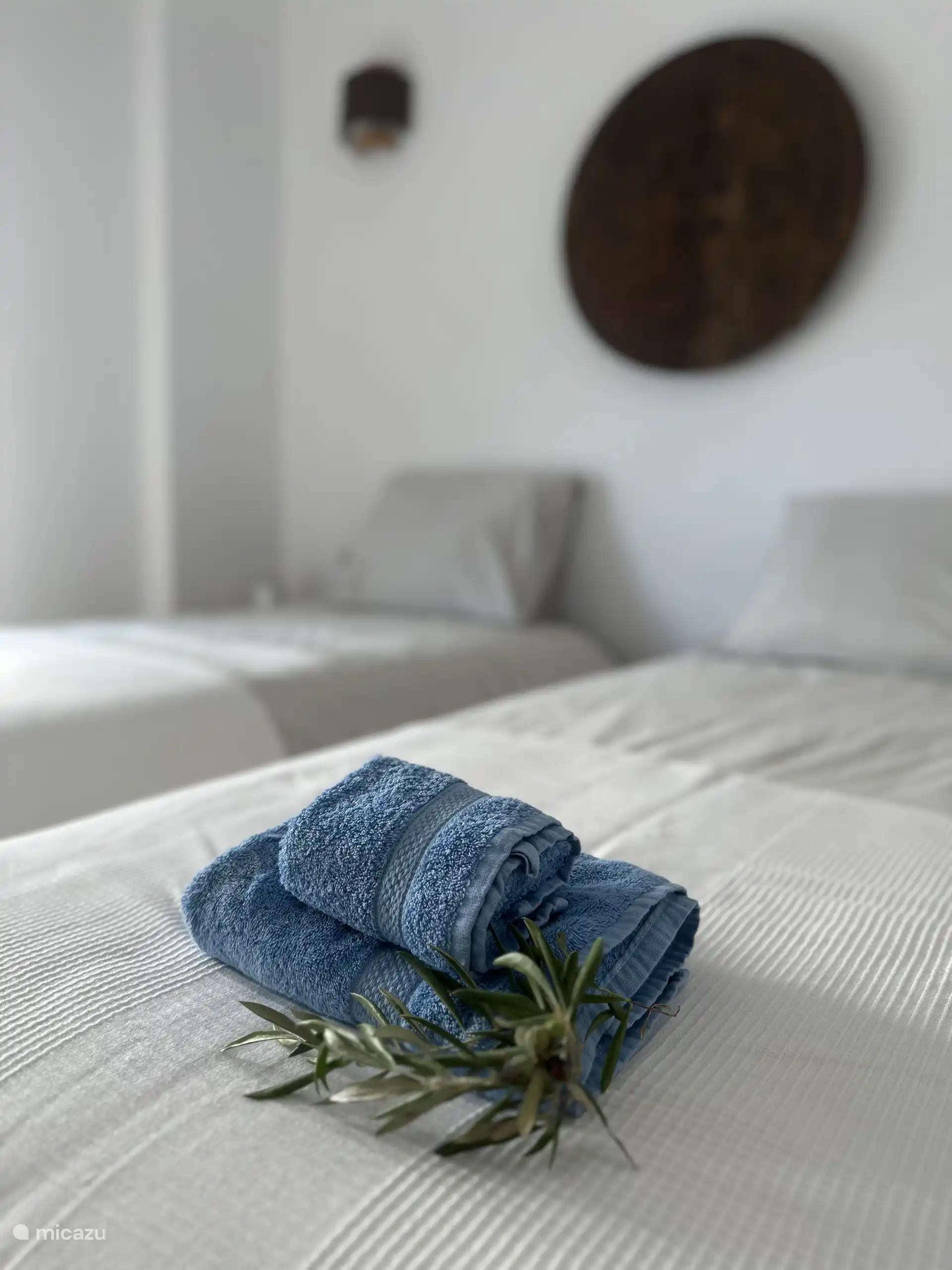 Bed linen and towels are provided. 