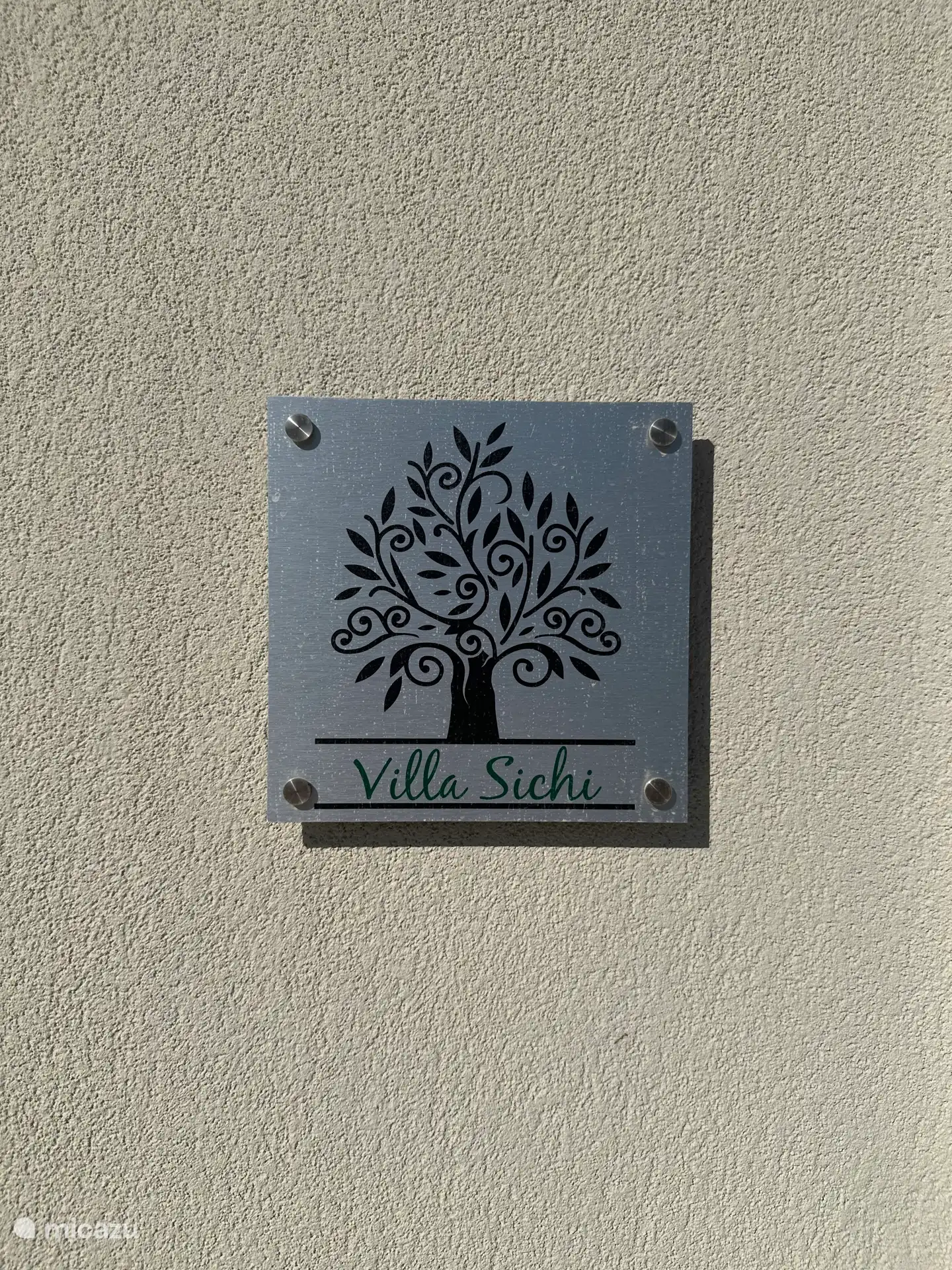 Villa Sichi logo at the front door.