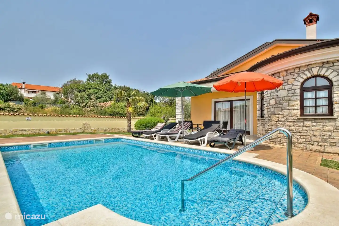 swimming pool + sunbeds