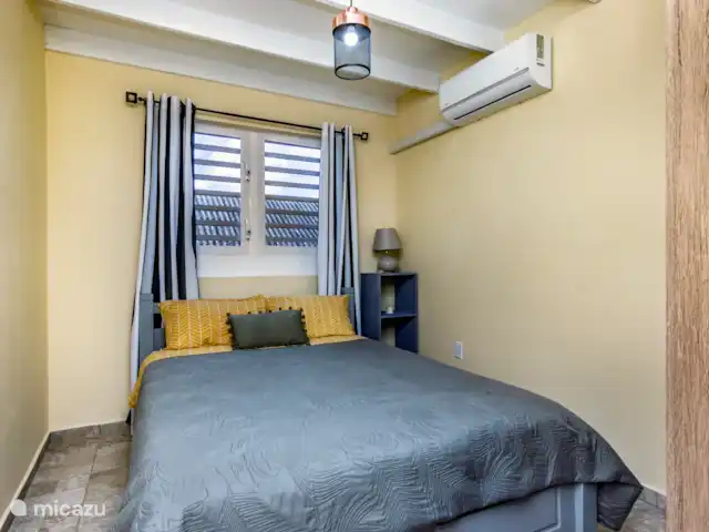 Location de Vacances Curaçao, Curaçao-Centre, Curasol, appartement - Las Dahlias Apartments - El Mirador  Appartement 1 chambre avec un lit double confortable et la climatisation