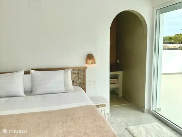 Villa Tranquilla - NEW IN JAVEA! in Spain, Costa Blanca, Jávea - villa Bedroom 2 with 180x200 bed with also a private bathroom with toilet. Here a private large terrace with seating for the morning or evening sun.