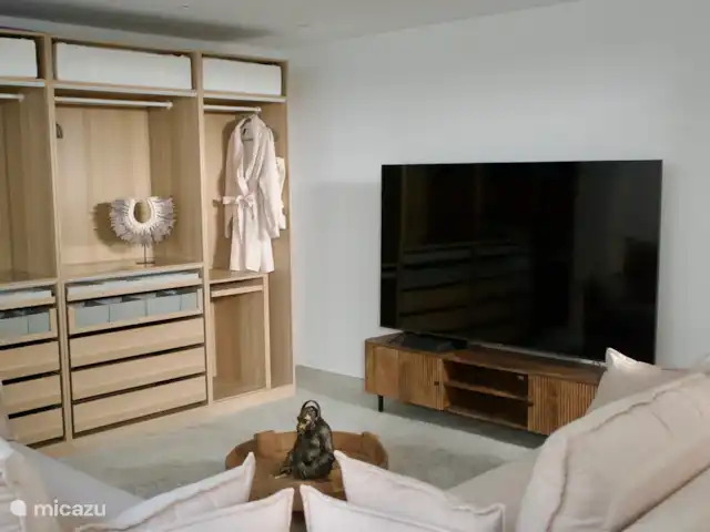 Villa Tranquilla - NEW IN JAVEA! in Spain, Costa Blanca, Jávea - villa On -1 a large room with two luxury sofa beds and 7 meters of closet space. A TV of 220cm and a playstation. Because there is also glass next to the stairs down there is a lot of daylight in this room