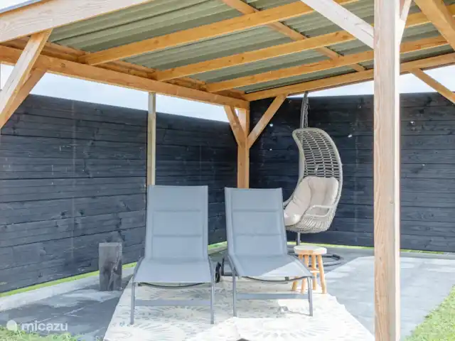 Location de Vacances Pays-Bas, Texel, Den Burgh, maison de vacances - Wulpenweid 12 De Meeuw Canopée dans le jardin
