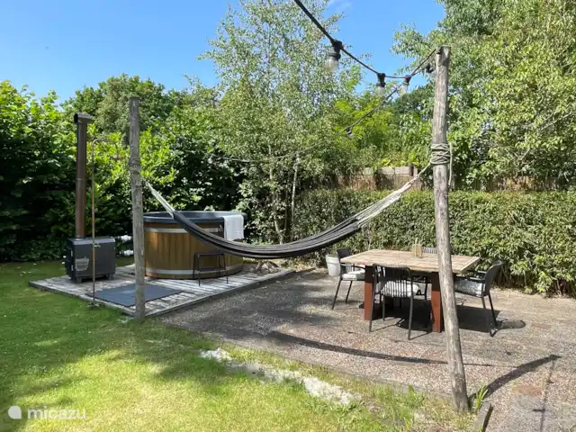 Boshuisje Elva huren in Nederland, Gelderland, Ermelo - blokhut / lodge Ontspannen in de hangmat.
