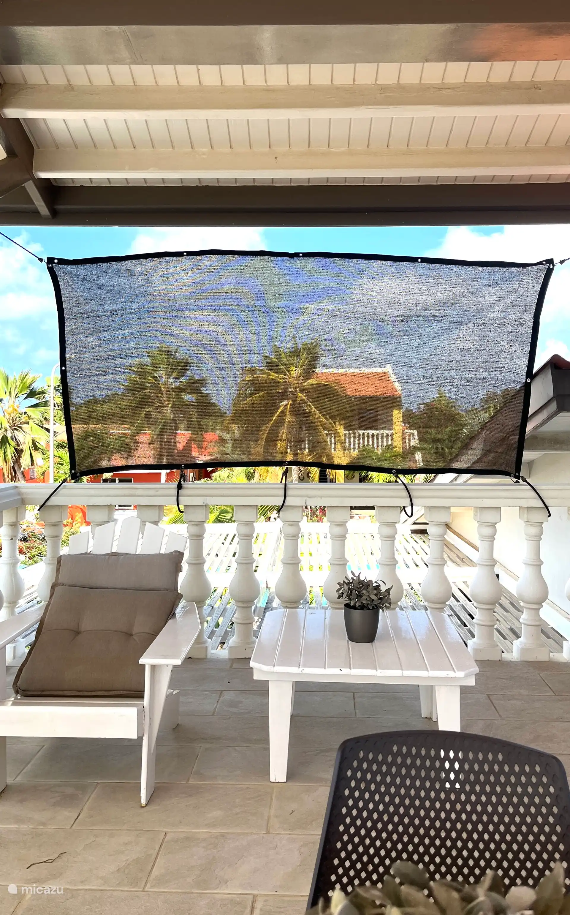 Dakterras met (nieuw) schaduwdoek.