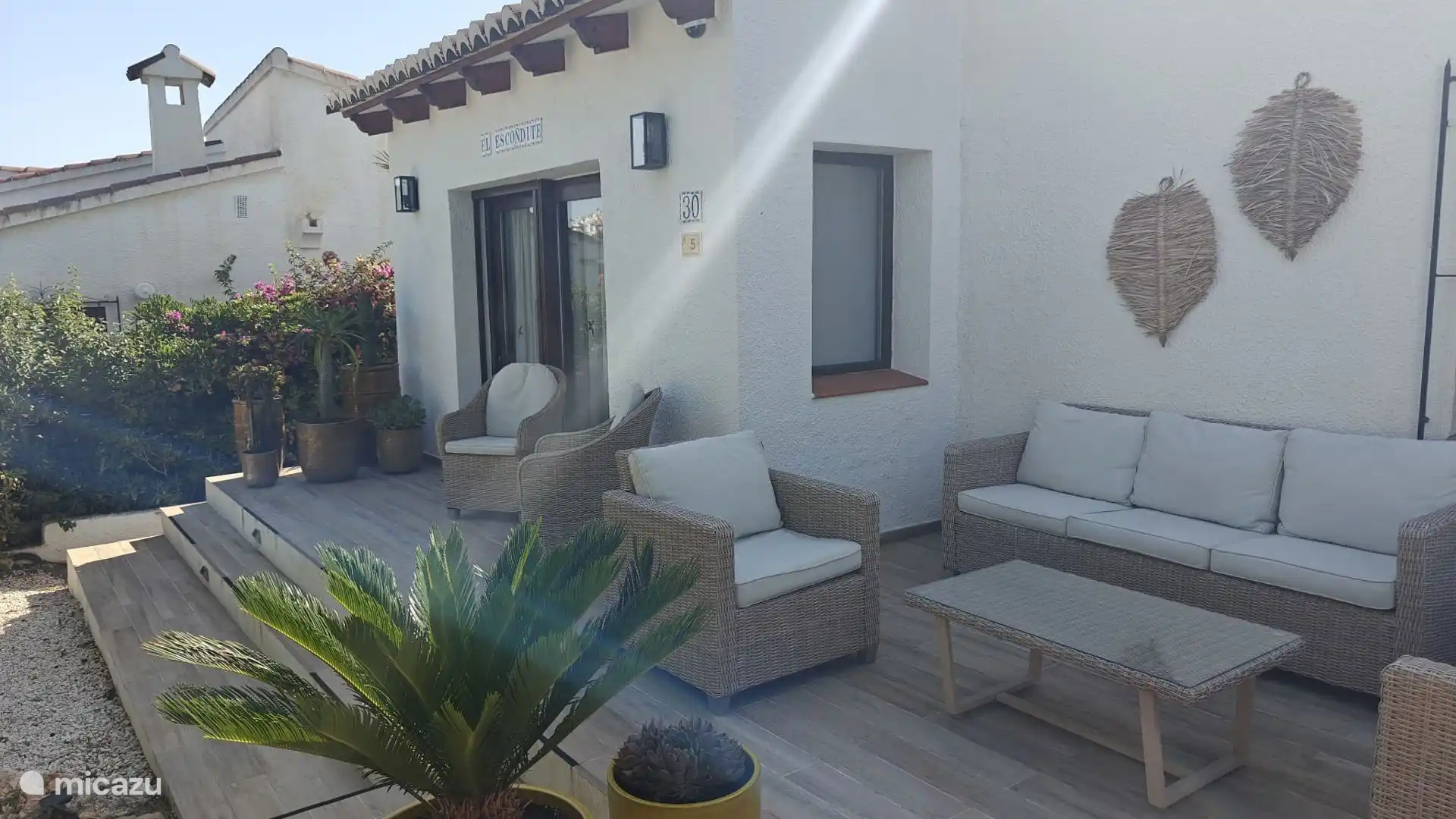 De gezellige en zonnige voortuin 