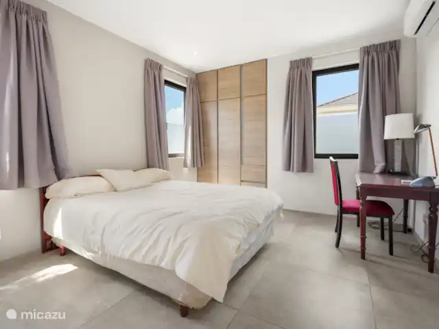 Location de Vacances Curaçao, Banda Ariba (est), Jan Sofat, villa - Villa exclusive avec piscine privée Chambre 3 avec un lit queen
Climatisation 
Possibilité de bureau
Téléviseur intelligent
Armoire spacieuse 
Salle de bain adjacente à la chambre.