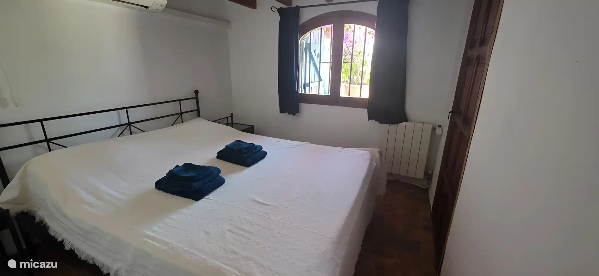 Bedroom (no. 4) with adjoining bathroom accessible from the Patio downstairs