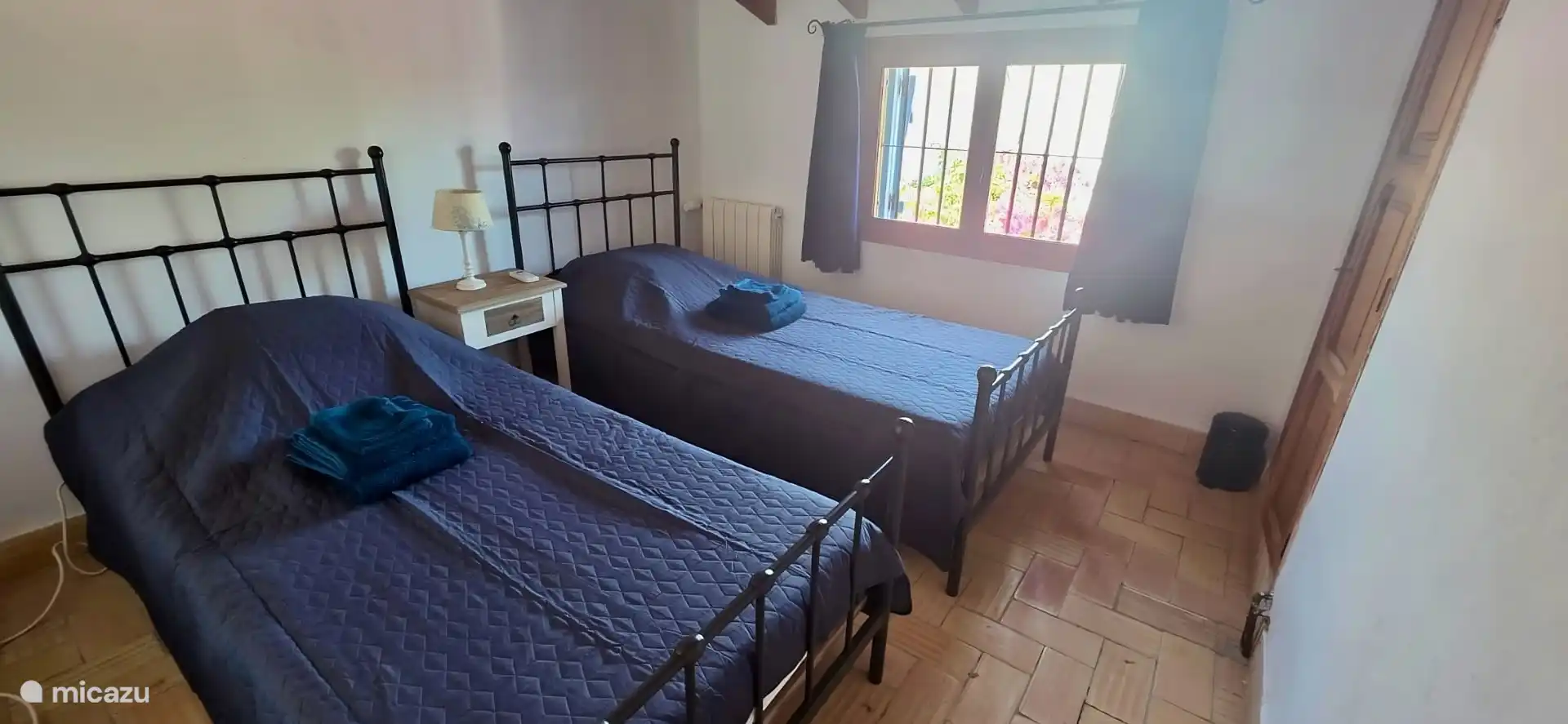 Bedroom (no. 3) accessible from the patio