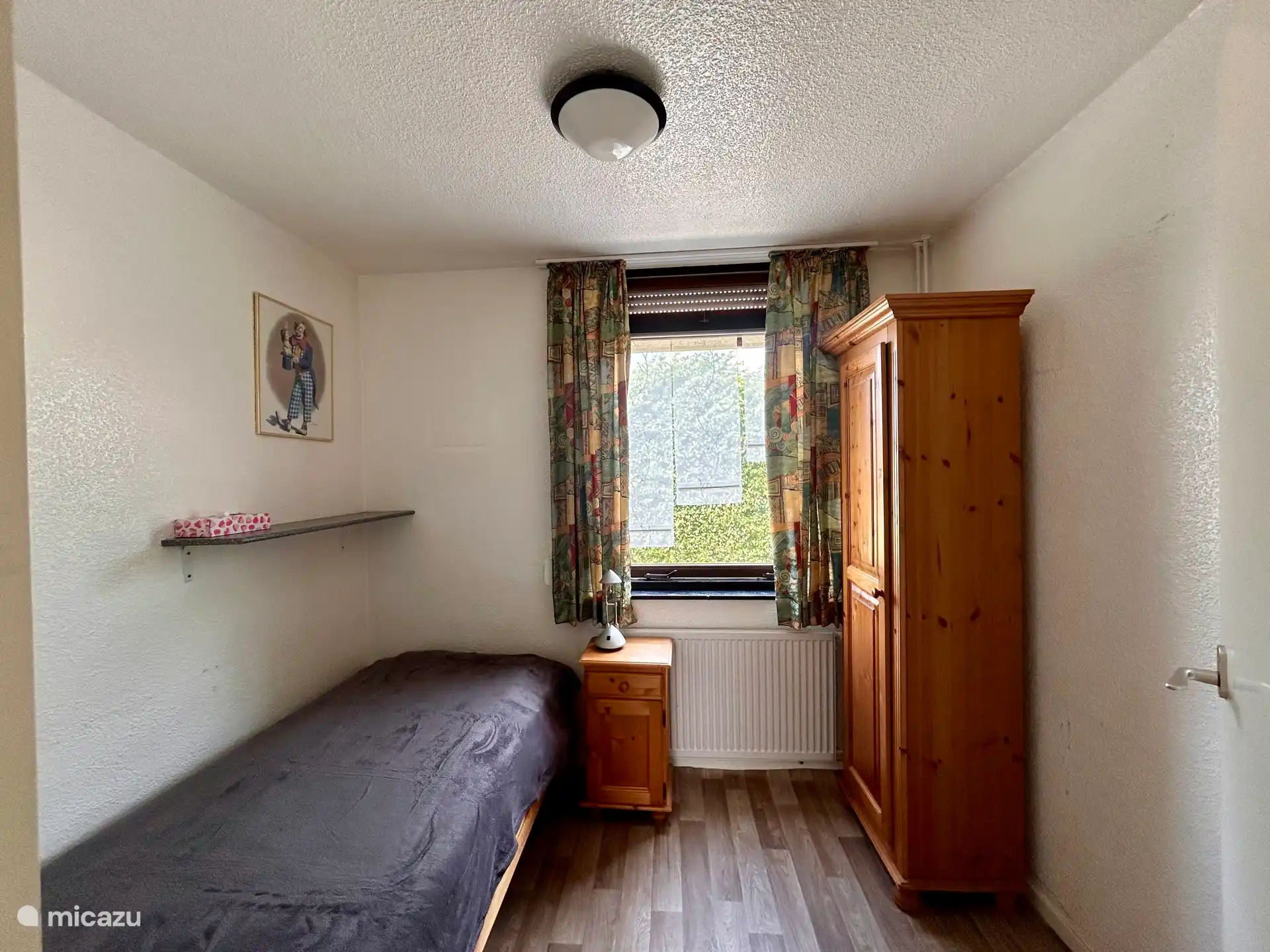 slaapkamer met 1 los bed