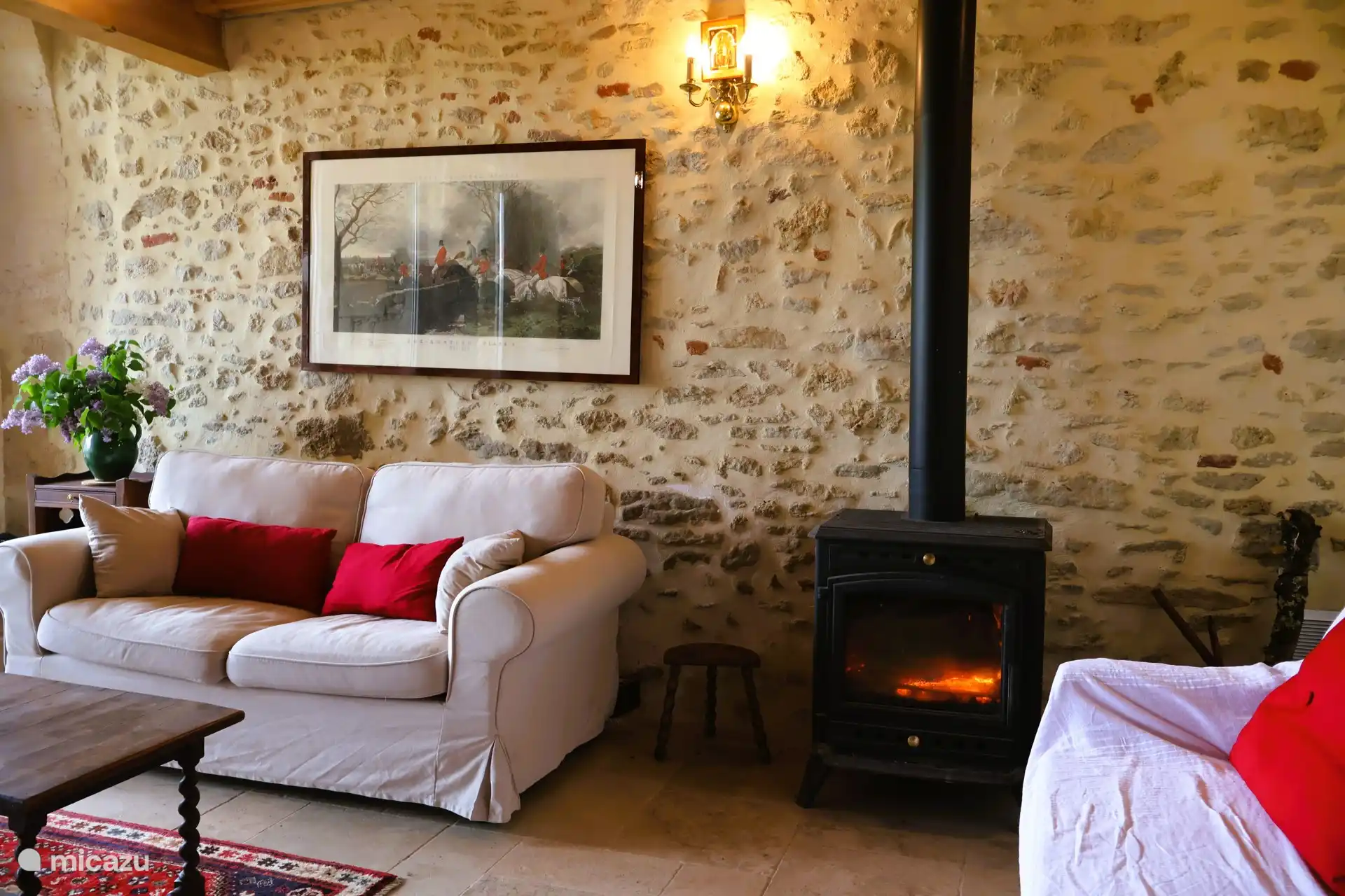 The cozy living room with wood stove