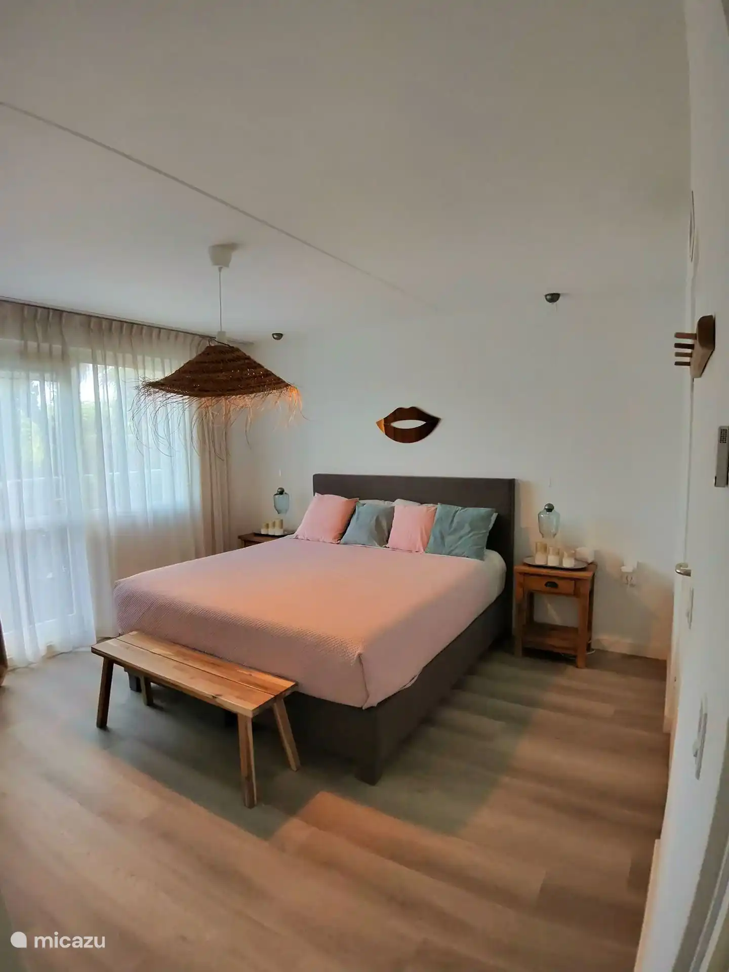 One of the two master bedrooms