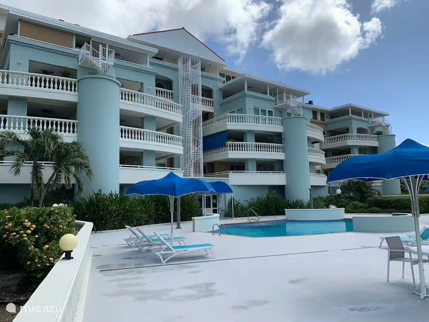 Rear/garden side with swimming pool