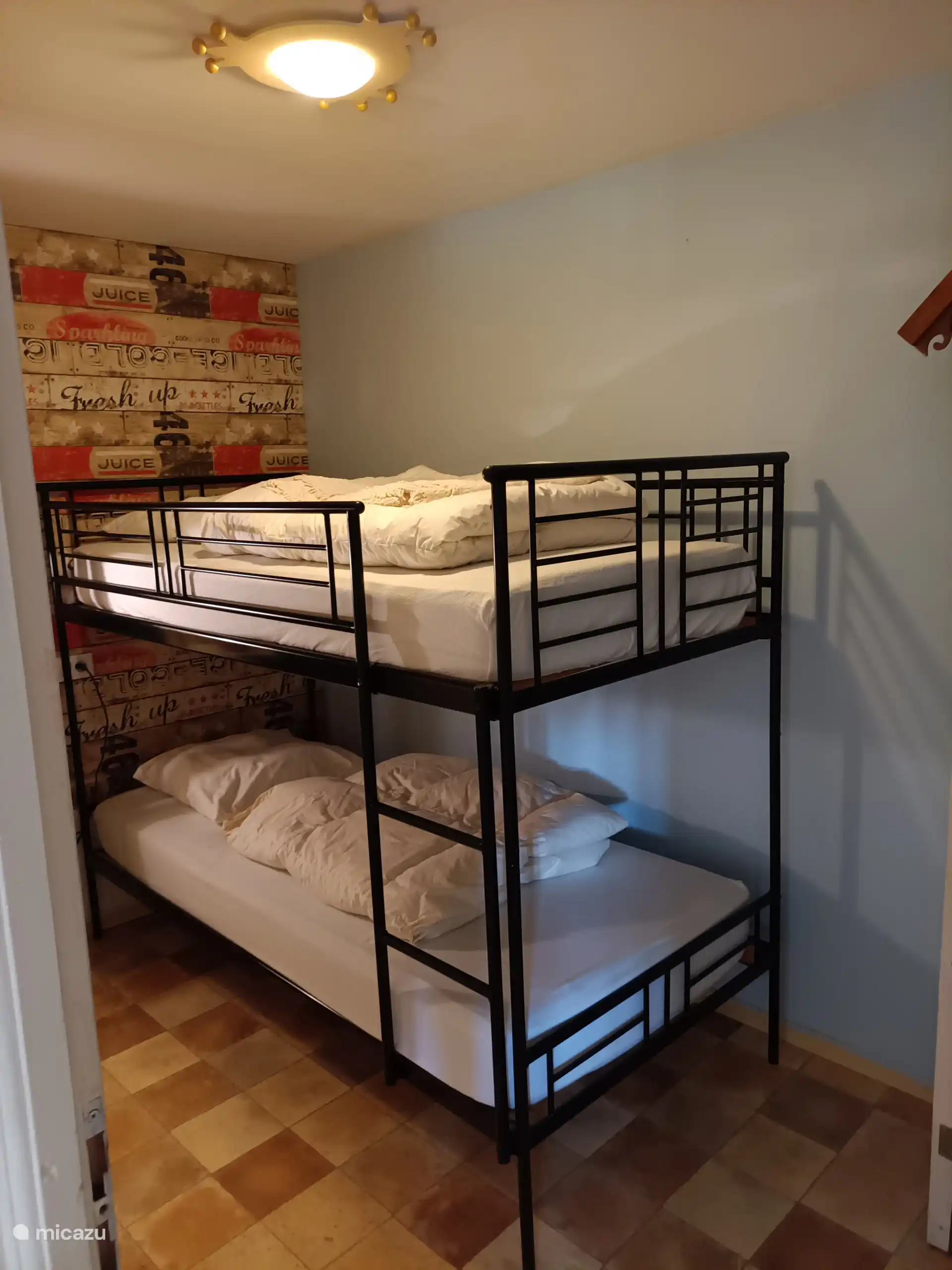 Espace couchage avec lits superposés