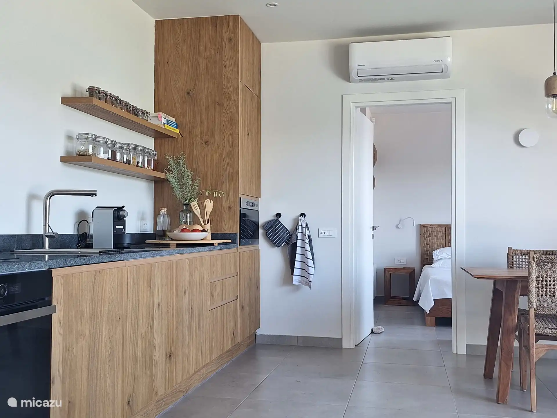 Full equipped open plan kitchen to make you feel like home. Large space for preparing your meals and 