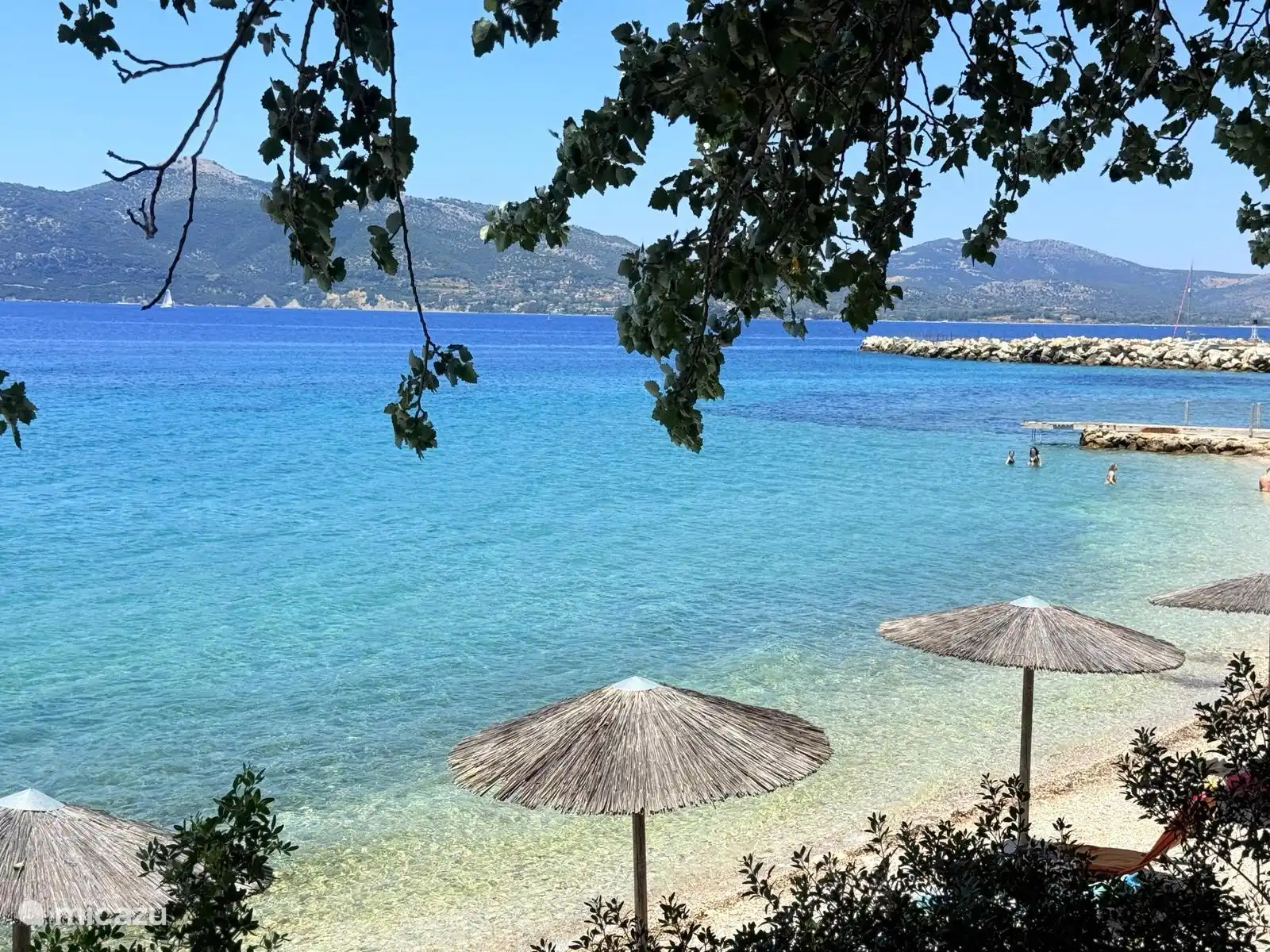 Emilios villas beach - featuring as well a nice taverna over the beach with lovely Greek food - better take the car, has parking space above the beach. Only at 5min drive of Villa Mare 