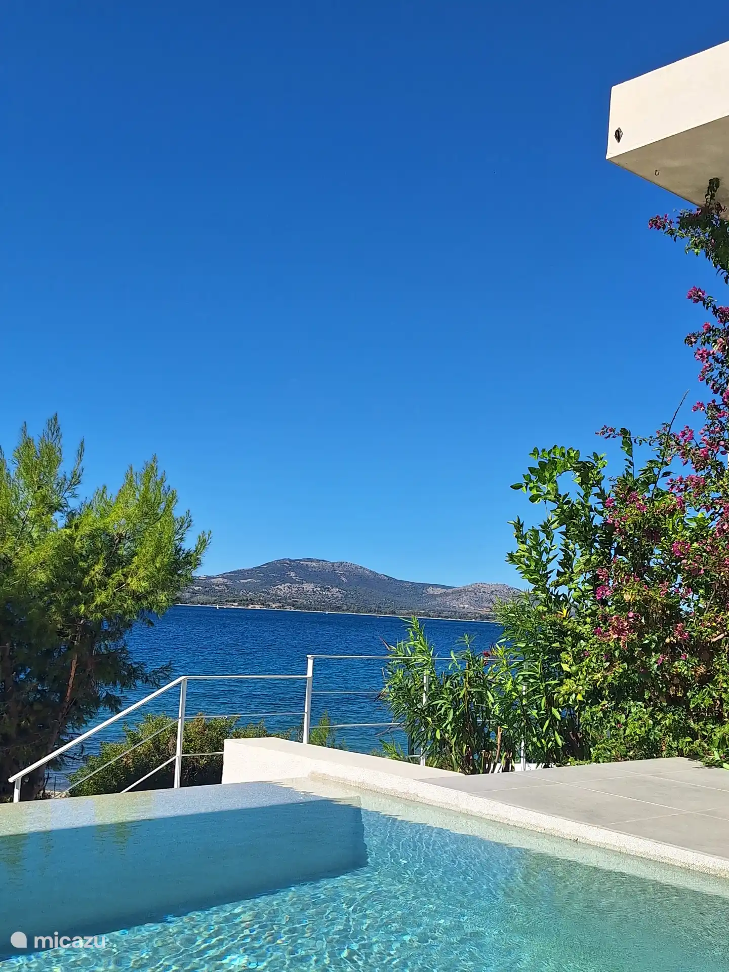 Few steps down the promenade from the pool.