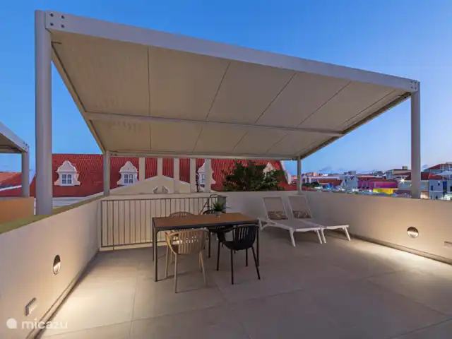 The Wharf 1D - au cœur de Willemstad | Curaçao, Curaçao-Centre, Willemstad - appartement Profitez du coucher de soleil depuis votre terrasse sur le toit.