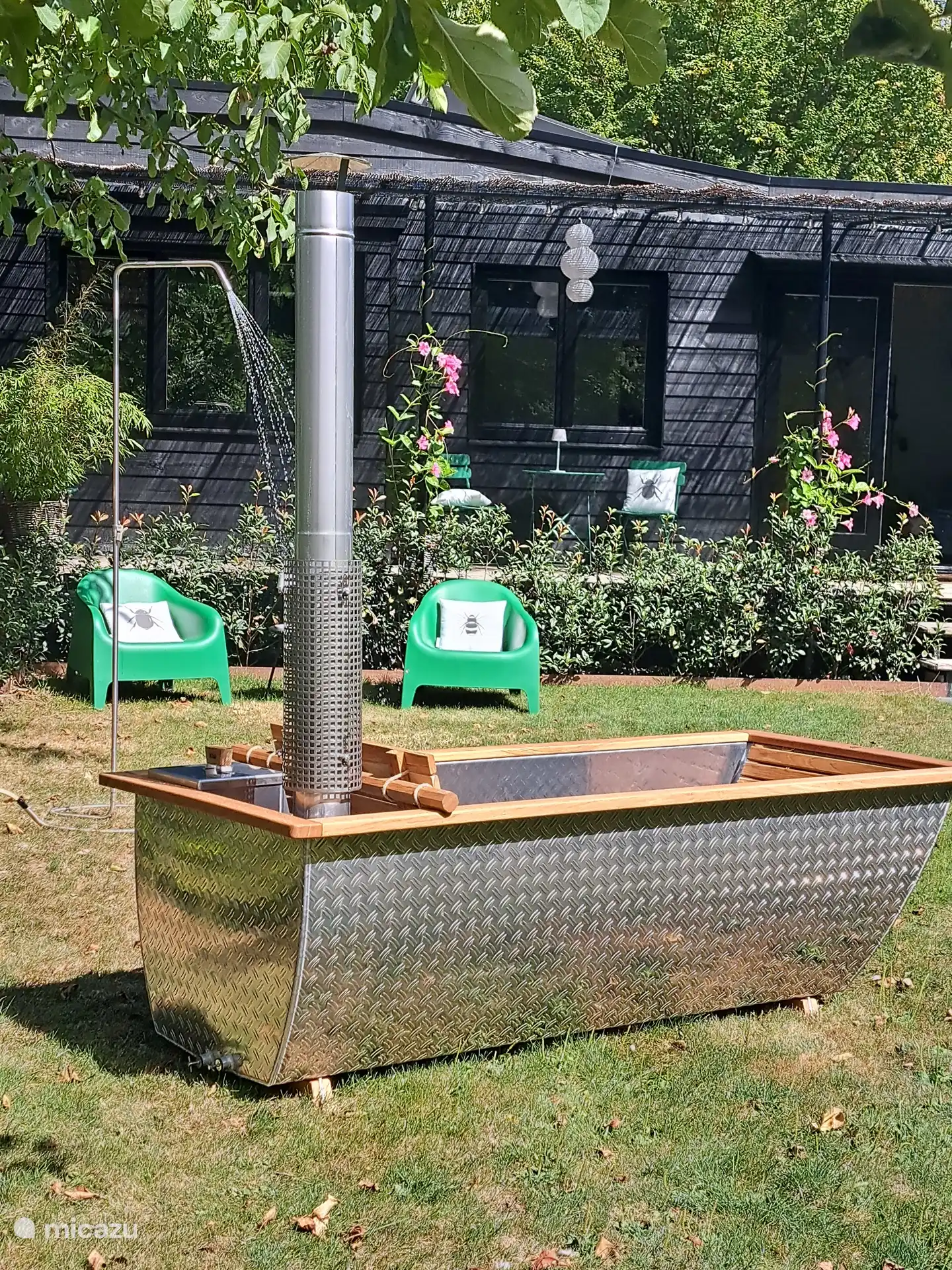 outdoor chairs at hot tub and outdoor shower