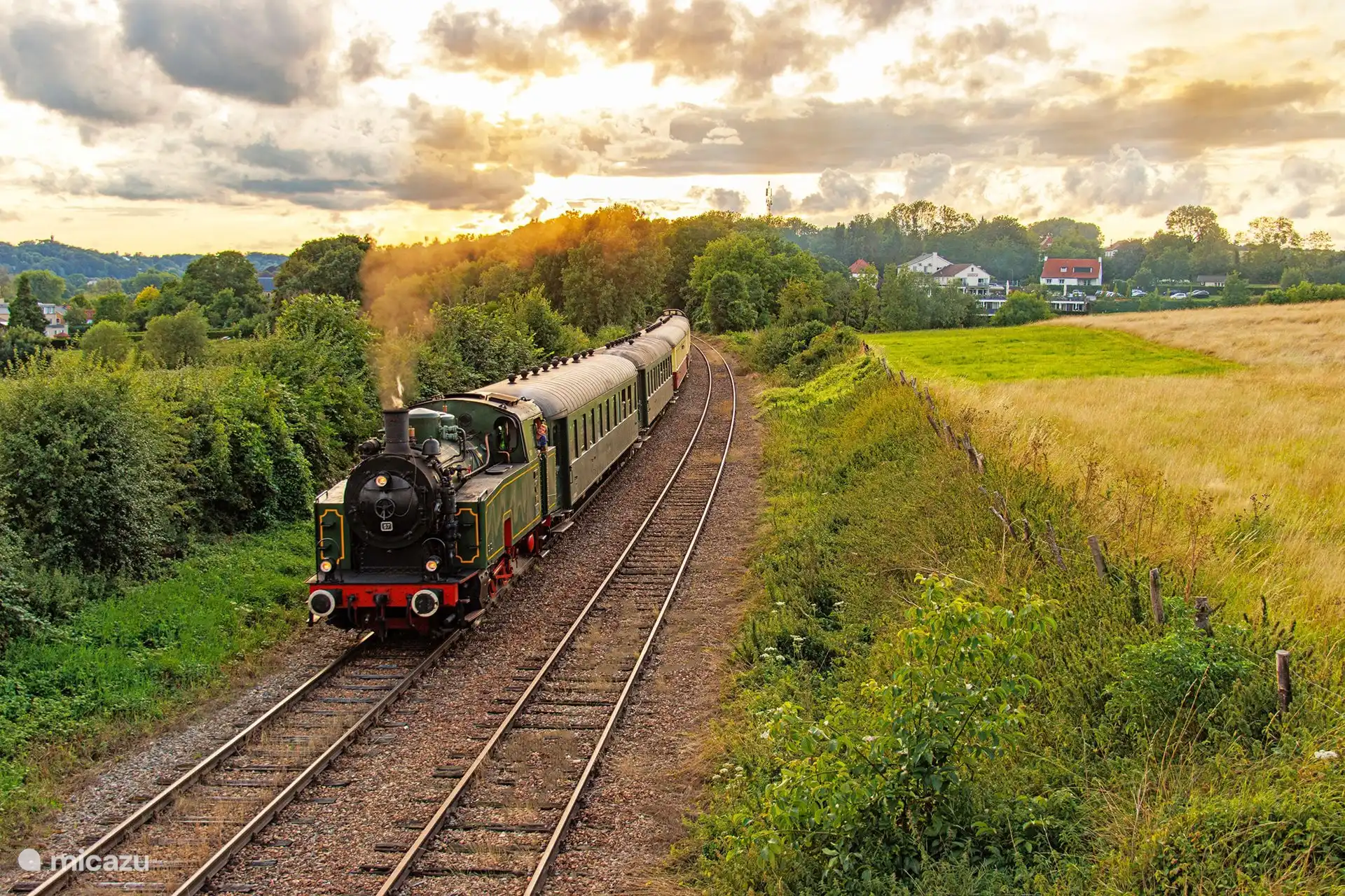 The nostalgic steam train on the million line near our house. Drive through a beautiful hilly landscape