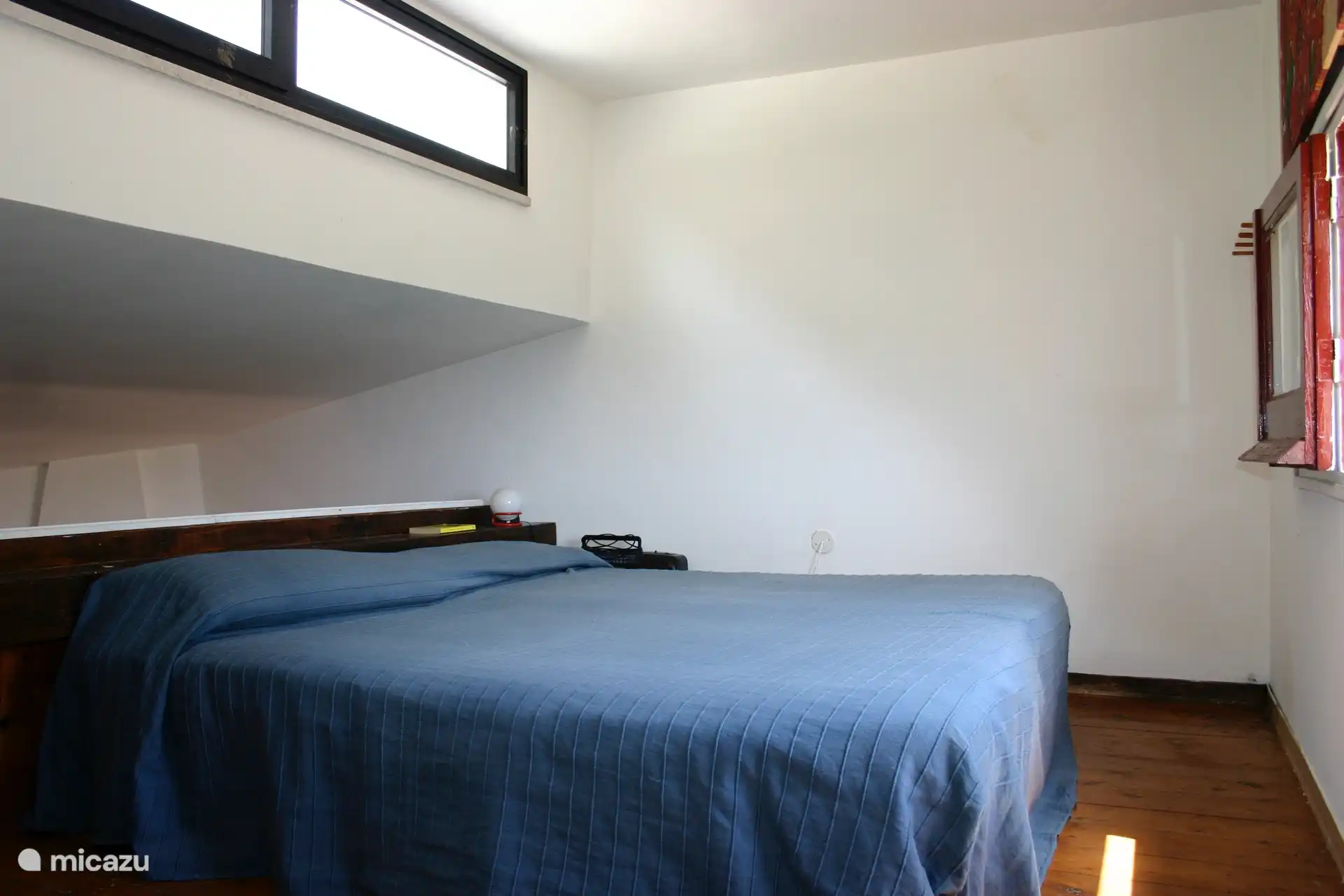 The bedroom on the mezzanine, with double bed OR 2 single beds.