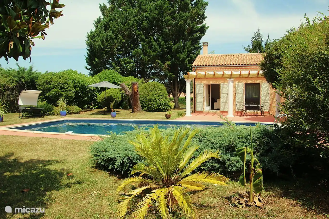 Large private swimming pool in the garden