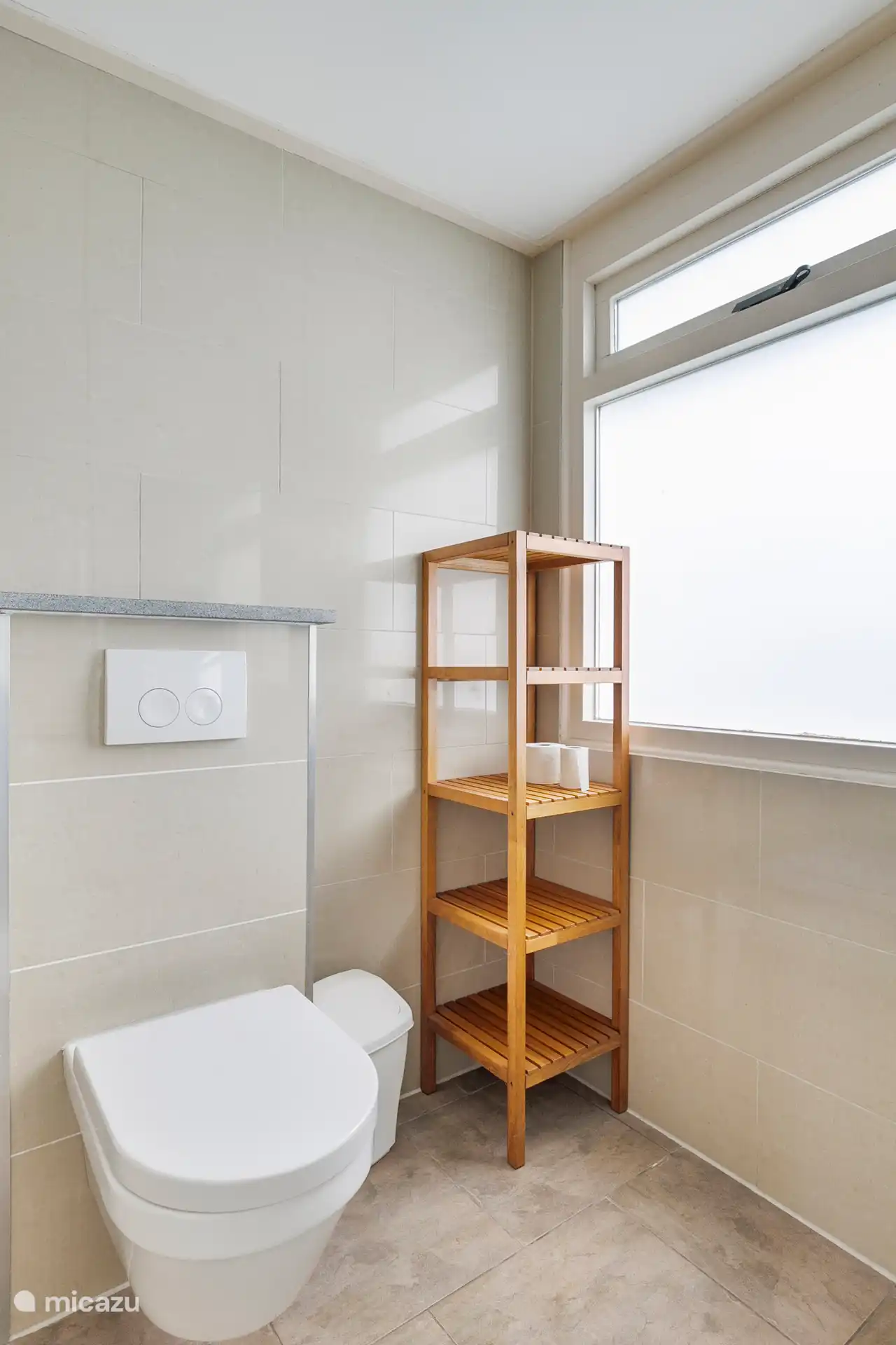 Bathroom with extra toilet, shower and sink. 