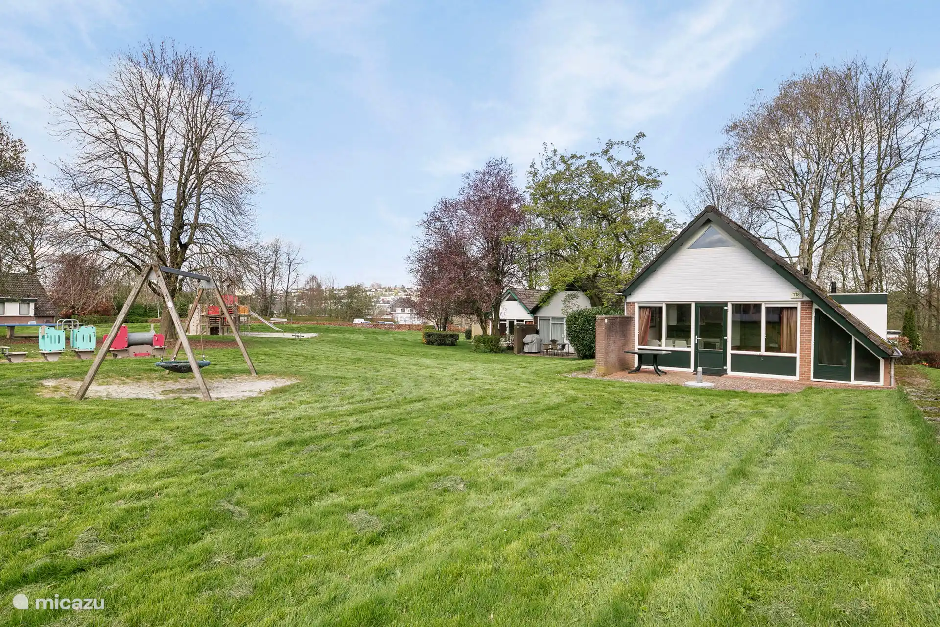 Large playground adjacent to private terrace. 