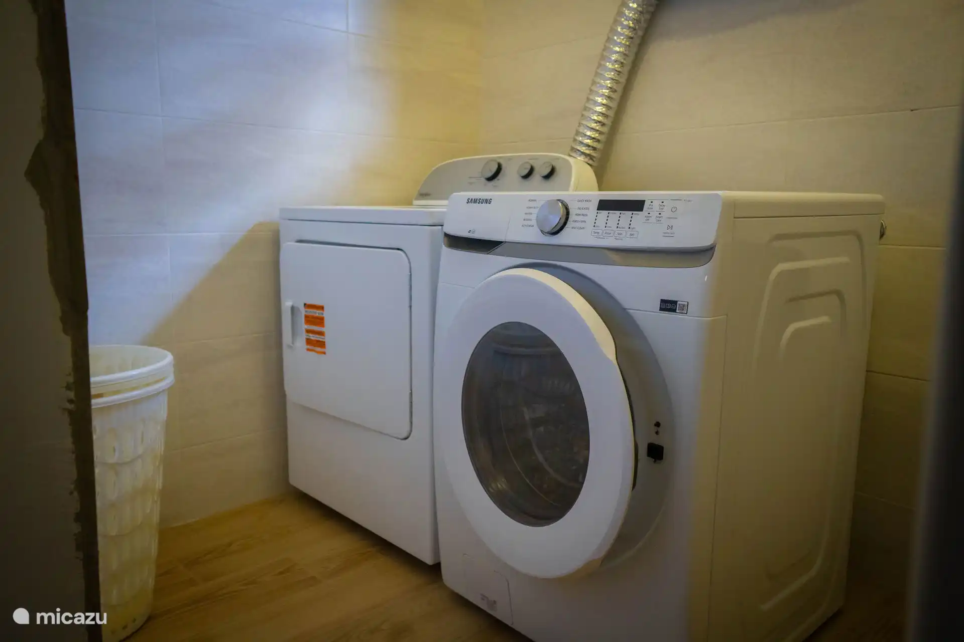 Laundry room with washing machine and dryer