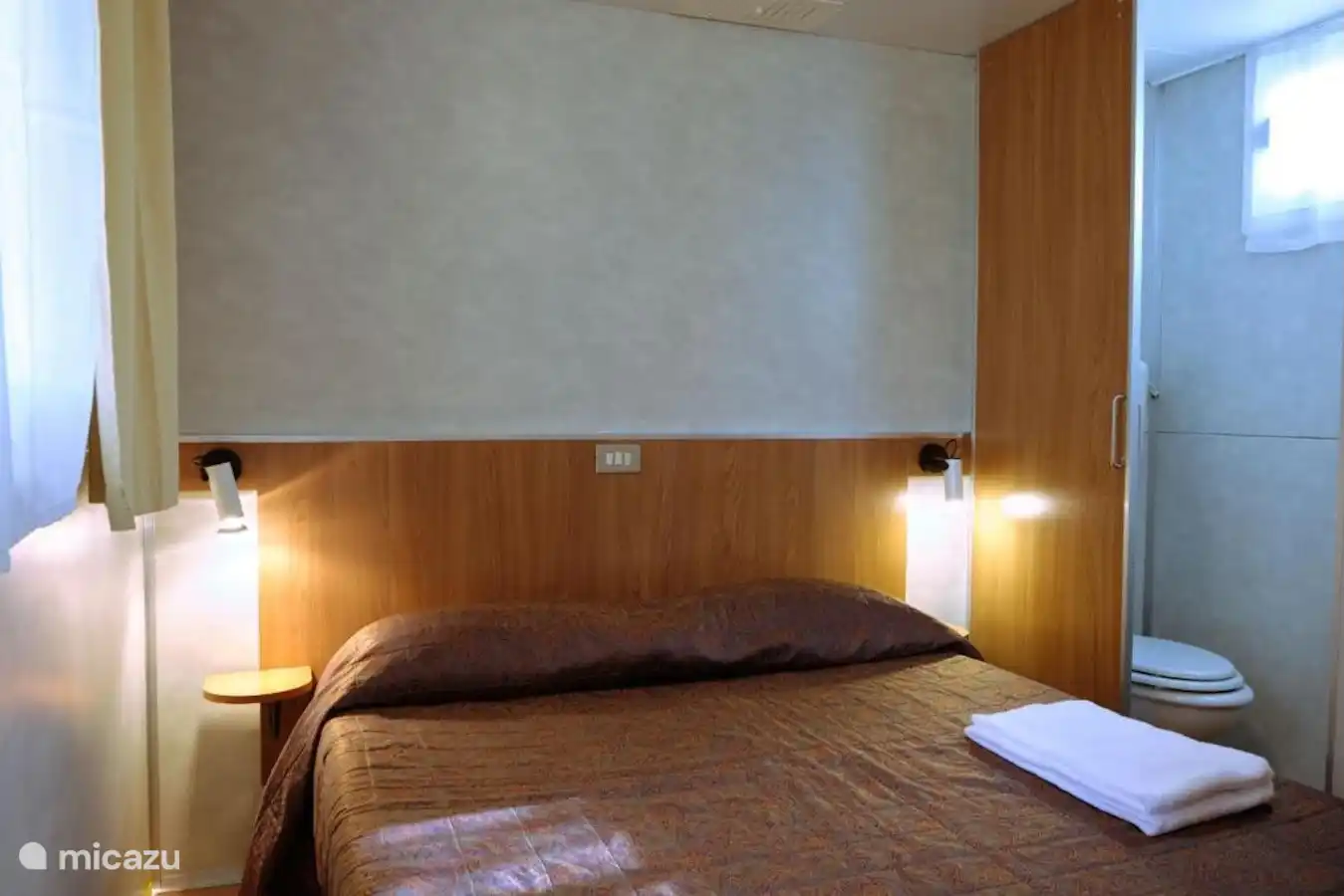 Bedroom I with double bed and ensuite toilet