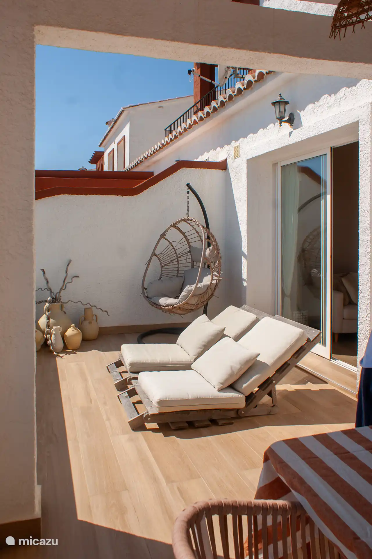 Nice sun beds on the balcony. From the balcony you have a beautiful sea view.