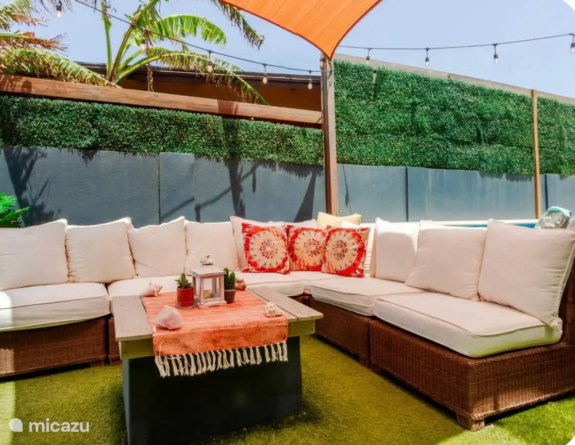    Relax in the shaded outdoor lounge.