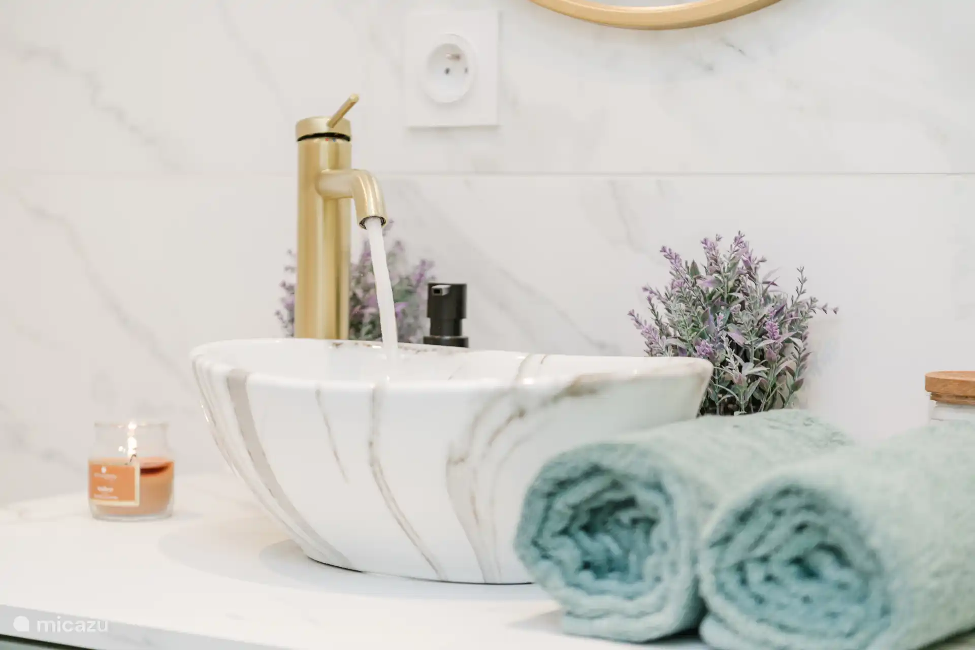 Toilet area with individual bath towels provided for each traveller.