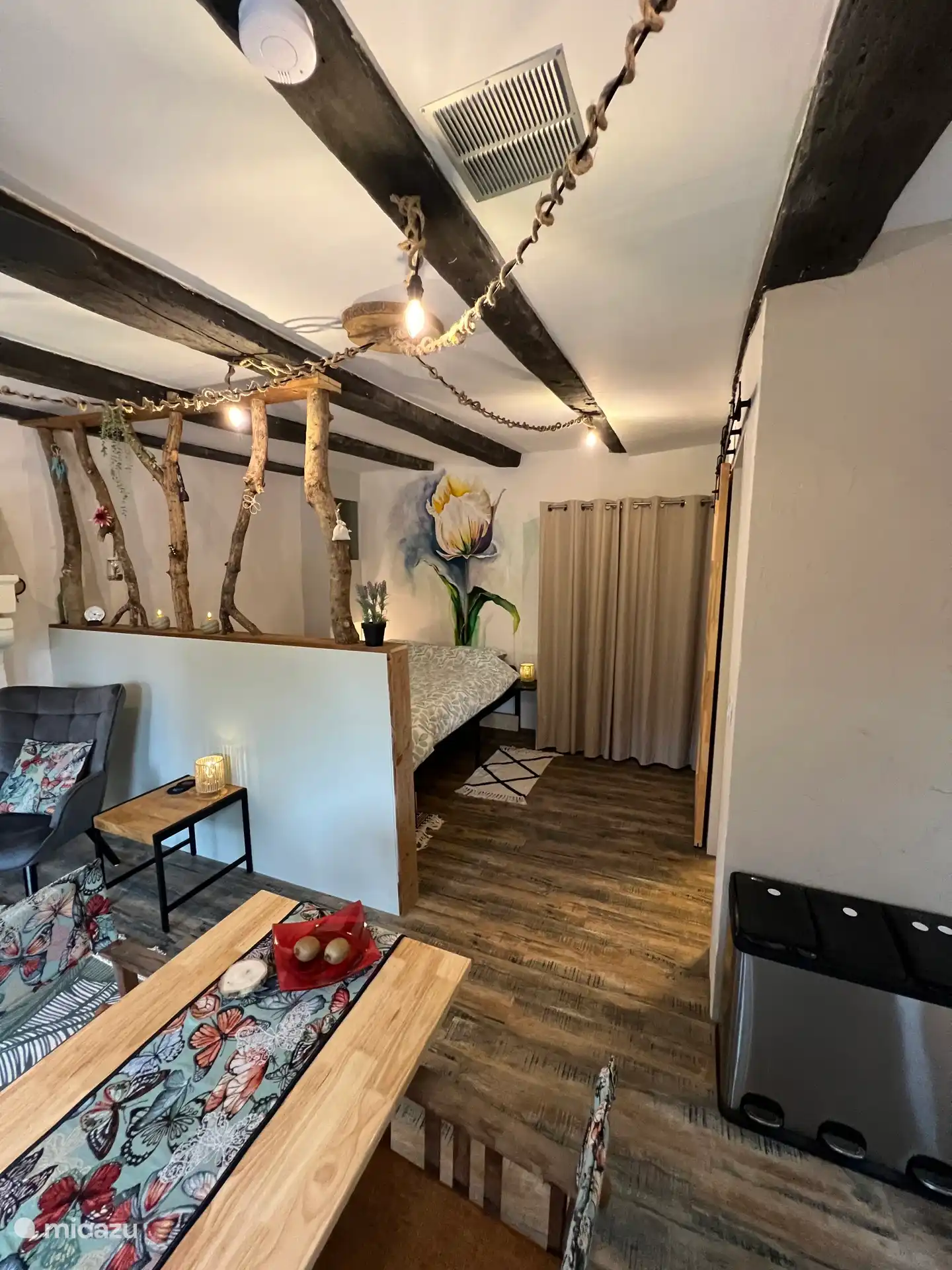 Sleeping area behind room divider